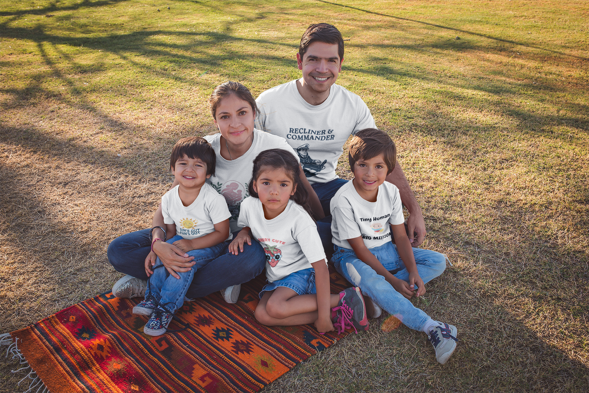 family wearing fathers day themed hammer and rattle t-shirts